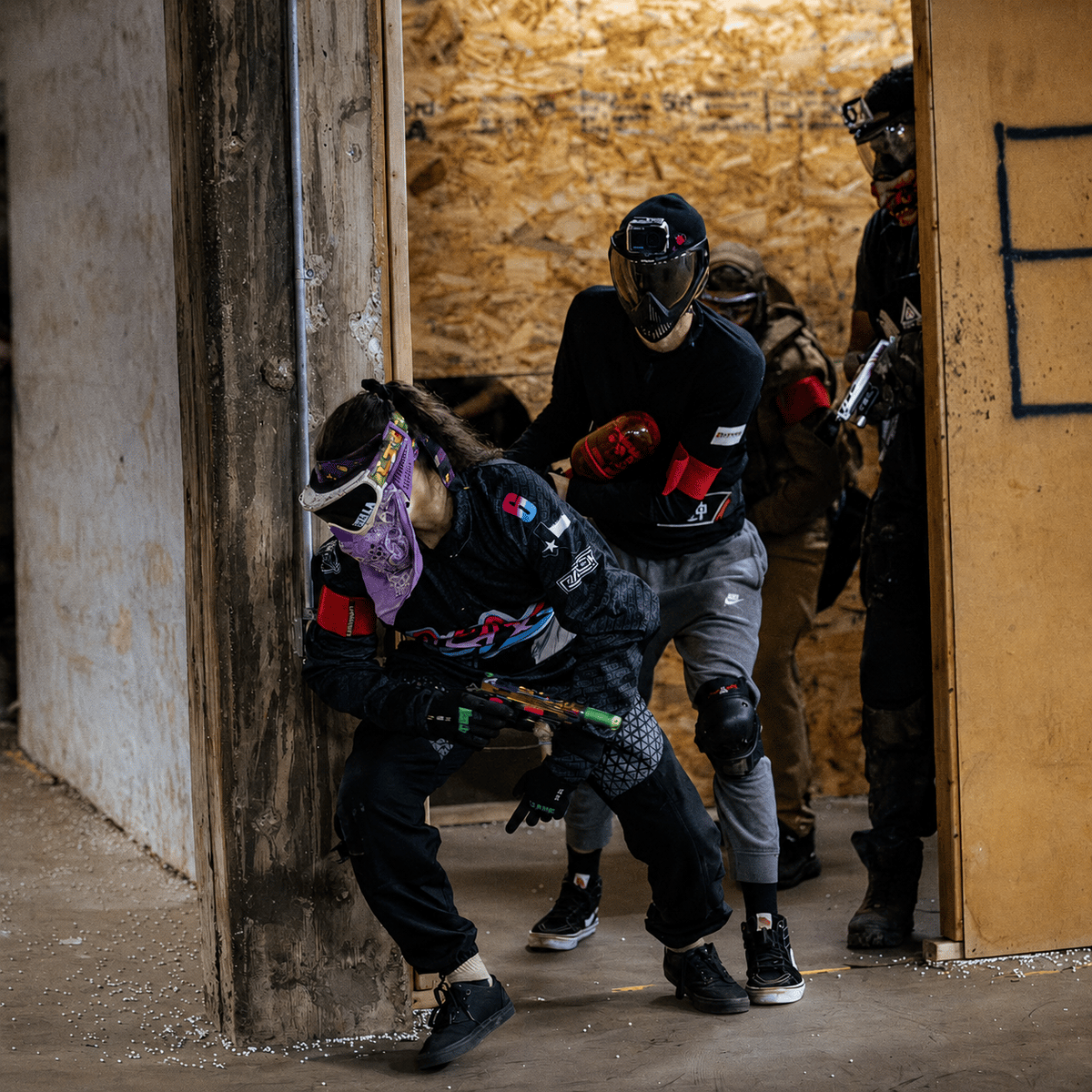 Players engaging in a game at Alternate Arms Airsoft
